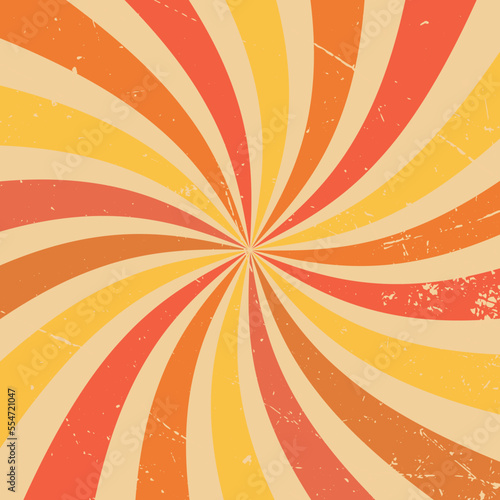Retro sunburst background pattern with a vintage color palette of yellow, orange and red in a spiral or swirled radial striped design. Faded paper effect