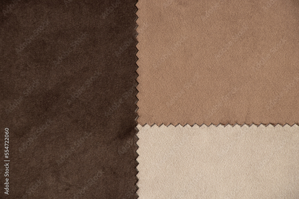 Three different brown fabrics, brown background, close up of velor fabric Three different brown fabrics, brown background, close up of velor fabric