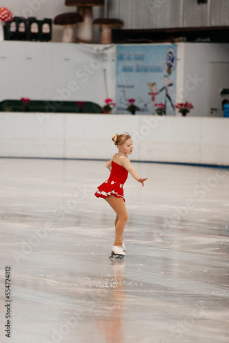 Little girl figure skating © Alena Vilgelm