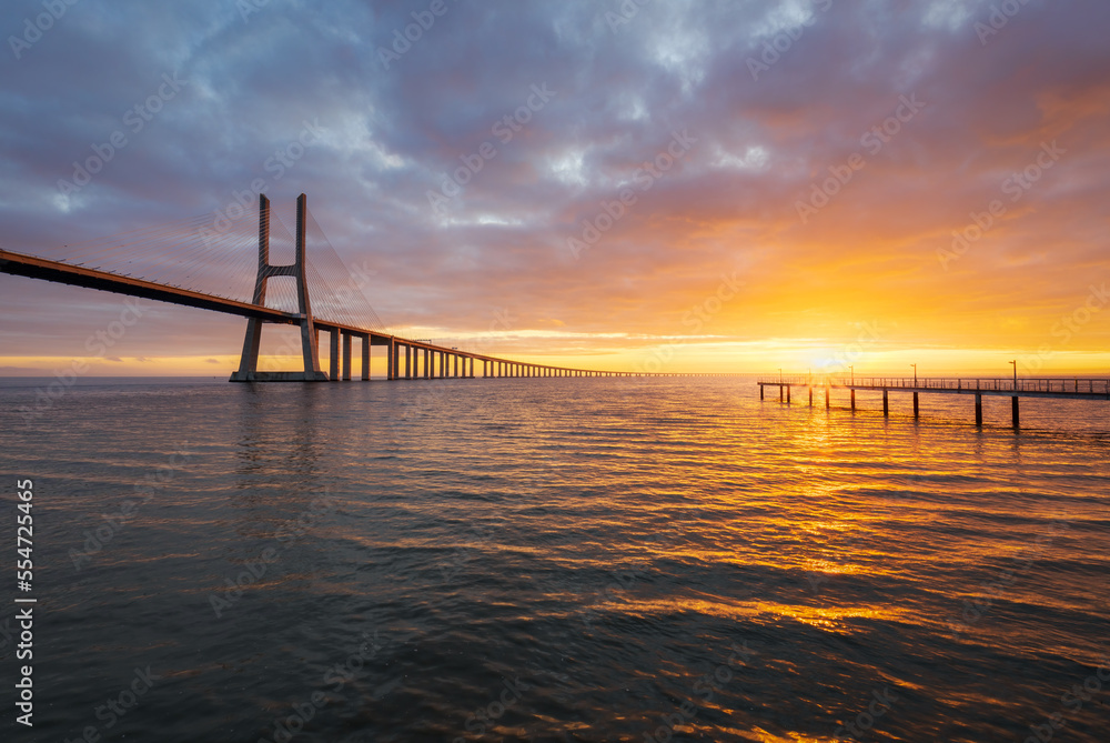 Ταπετσαρία Vasco da Gama bridge over tagus river in Lisbon, Portugal, at sunrise
