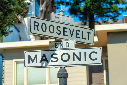 Road sign that reads Roosevelt and Masonic in historic district in downtown San Francisco California