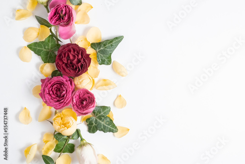 Festive floral background. floral layout from peach and orange flowers isolated. 
