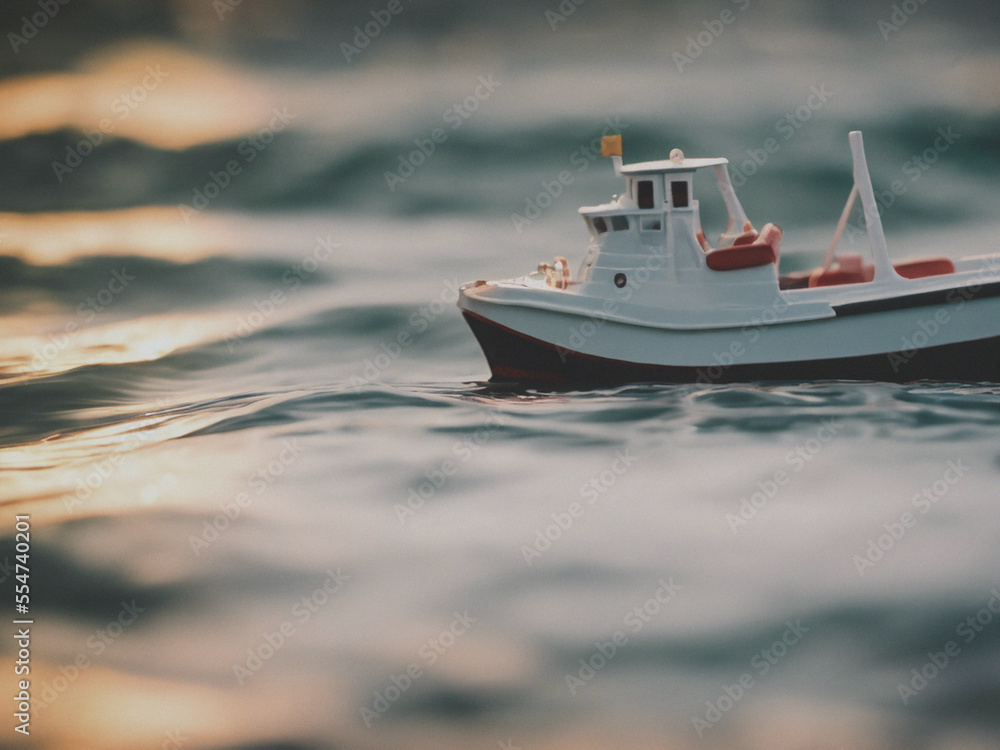 Fototapeta premium toy boat in the sea