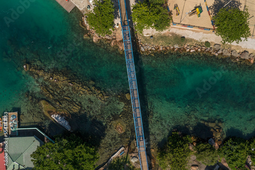 Aerial view of a blue bridge in Florianópolis 