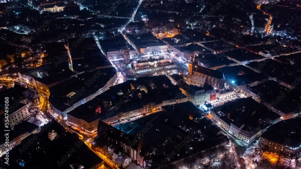 Aerial Krakow Main Market Square with Christmas Tree and Cloth Hall time lapse Aerial. Night timelapse of Rynek Glowny square on Christmas. Aerial Krakow Main Market Square with Christmas Tree and Cloth Hall time lapse Aerial. Night timelapse of Rynek Glowny square on Christmas.