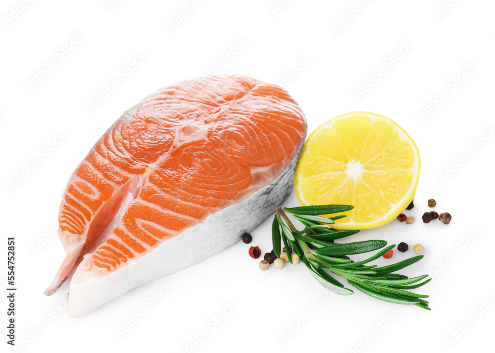 Fresh raw salmon steak with rosemary, peppercorns and lemon on white background Fresh raw salmon steak with rosemary, peppercorns and lemon on white background