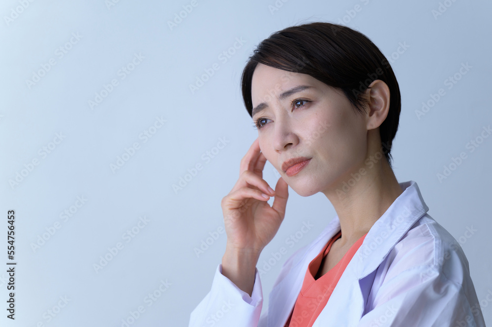 Negative image of a doctor (female doctor) in distress Negative image of a doctor (female doctor) in distress