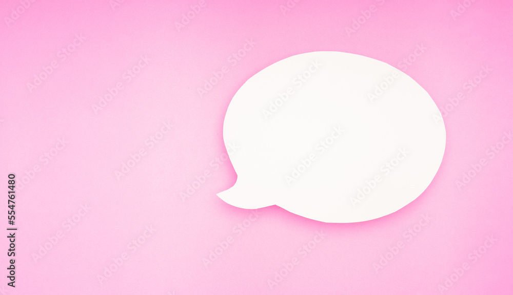 A blank white speech bubble on a pink background A blank white speech bubble on a pink background