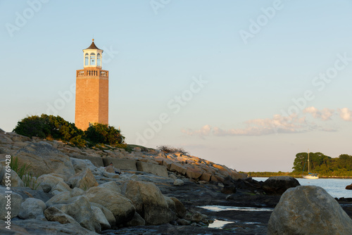 Avery Point Lighthouse in Groton Connecticut Atlantic Ocean at Low Tide photo