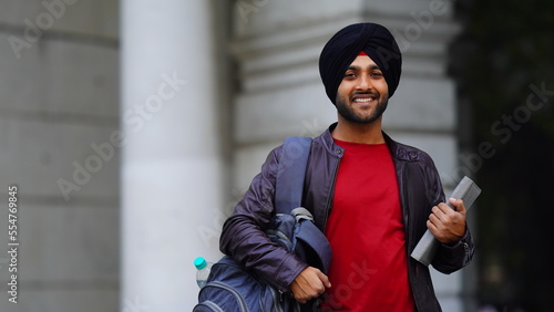 sikh college student image Young punjabi boy with confidence and bag photo