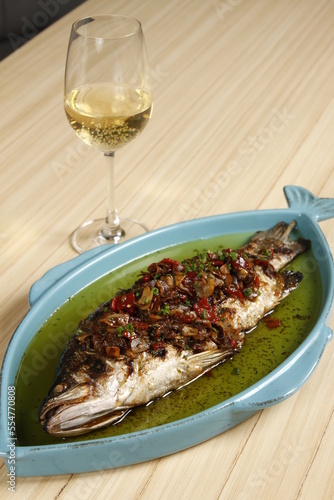 Baked whole lapu lapu fish, a dish from the Philippines photo