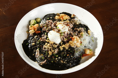Squid ink palabok, a variation of a noodle dish from the Philippines