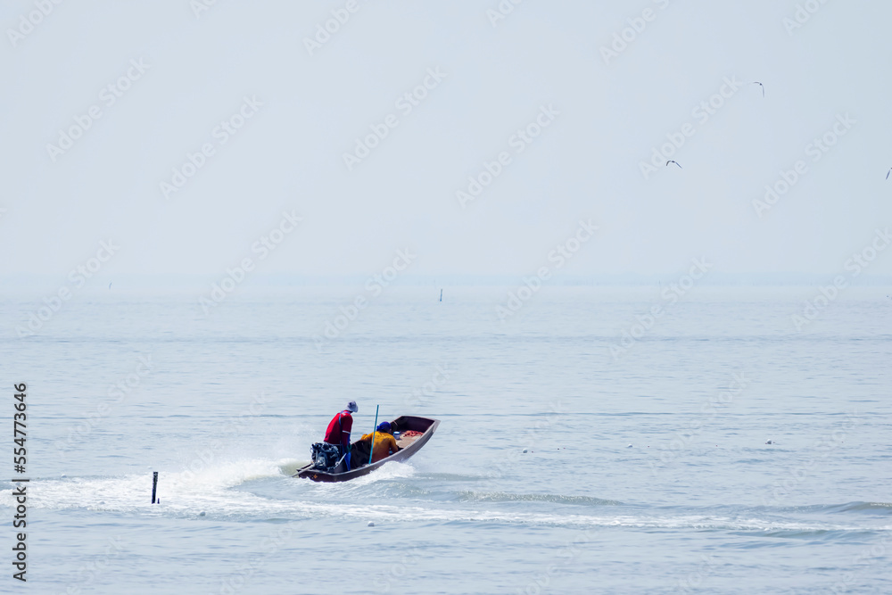 Obraz premium The local fishing boat on the river