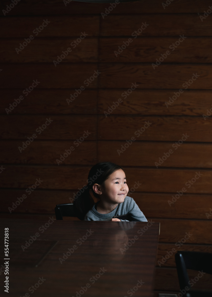 little girl sitting on a chair little girl sitting on a chair