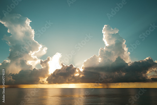 Sunset on sea background. Nature wallpaper with summer sea. Water sea texture. Calm sunrise on tropical sea. Calm ocean.