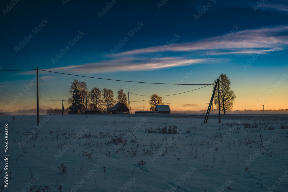 Abandoned farm house at sunset in the field Abandoned farm house at sunset in the field