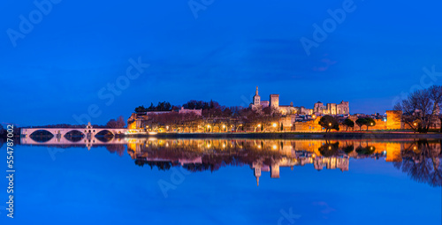 Avignon Bridge with Popes Palace on the Rhone River at twilight blue hour - Pont Saint - Benezet, Provence, France