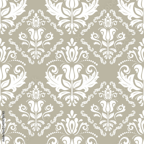 Classic seamless pattern. Damask orient ornament. Classic vintage beige and white background. Orient ornament for fabric, wallpaper and packaging