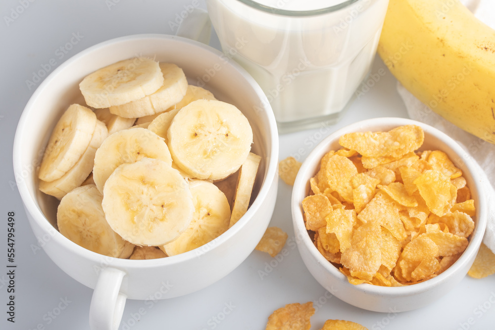 Cornflakes breakfast, banana, fresh milk, healthy food Cornflakes breakfast, banana, fresh milk, healthy food