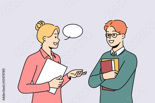 Smiling businesspeople with speech bubble above head communicate in office. Happy employees or colleagues talk discuss ideas. Vector illustration. 