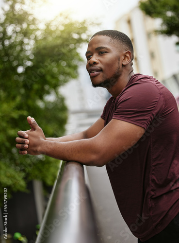 Photography Fitness, wellness and black man relax in the city enjoying break after exercise, training and running