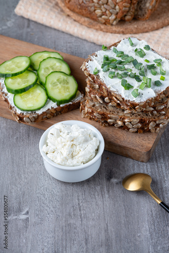 Healthy sandwich with white cottage cheese and cucumber