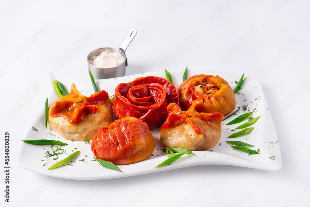 fried manti with sour cream on a white background fried manti with sour cream on a white background