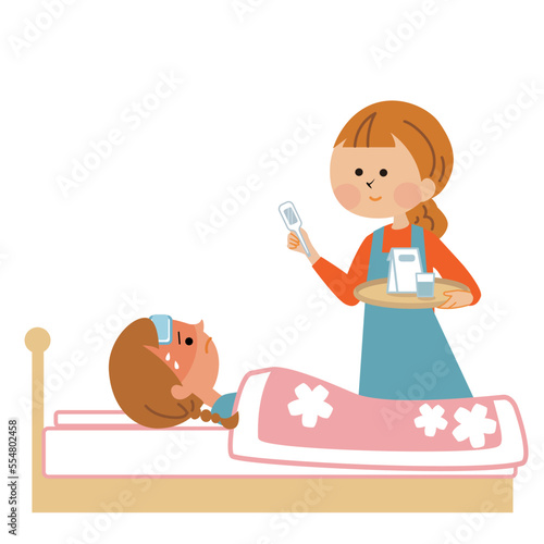 子供の看病をするお母さん