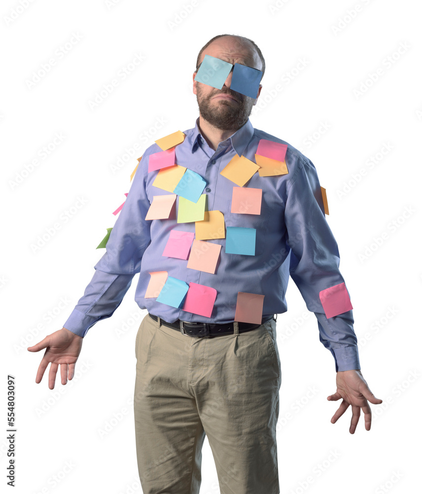 Confused businessman covered with sticky notes Confused businessman covered with sticky notes