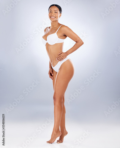 Health, natural beauty and black woman in underwear with body care mindset on studio background. Fitness, wellness and healthy woman in lingerie and motivation for good diet, nutrition and lifestyle.