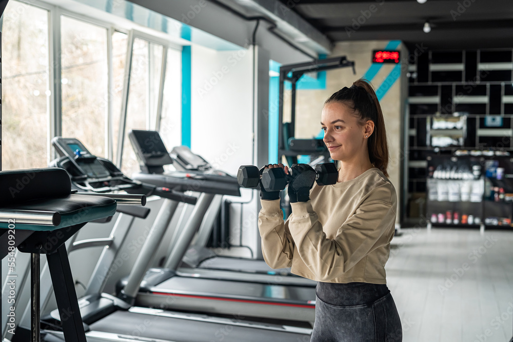 beautiful beauty who trains for health came to a beautiful spacious hall. beautiful beauty who trains for health came to a beautiful spacious hall.