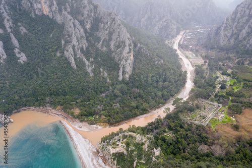 Fototapeta Naklejka Na Ścianę i Meble -  Aerial view of Olympos Ancient City and the beach after winter heavy rains. Turkey..