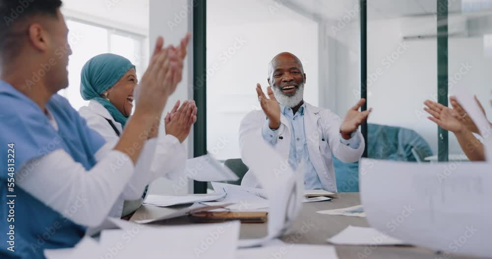 High five, applause and doctors throw paper in celebration of goals, targets or achievements. Meeting, teamwork and group of people or nurses throwing documents and clapping to celebrate success. High five, applause and doctors throw paper in celebration of goals, targets or achievements. Meeting, teamwork and group of people or nurses throwing documents and clapping to celebrate success.