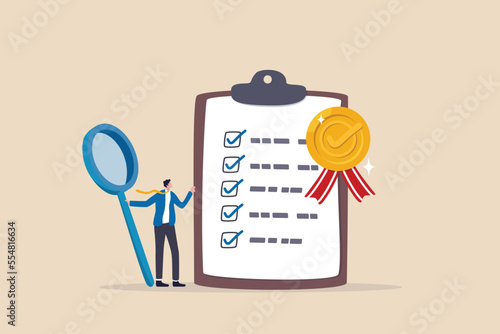 Standard, quality control or certified approval, corporate policy or compliance, guarantee checklist document, assurance concept, businessman hold magnifying glass with standard QC badge document. photo