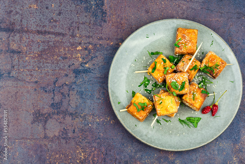 Skewers with fried tofu cheese photo