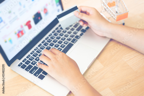 Woman paying online shopping with credit card