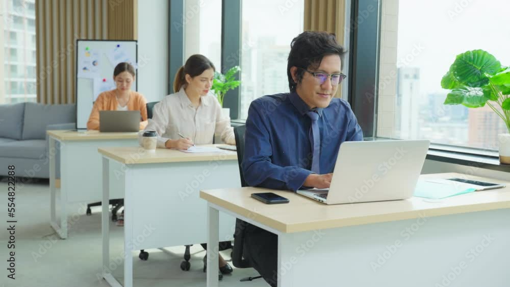 Group of young businessman and businesswoman people working in office Group of young businessman and businesswoman people working in office
