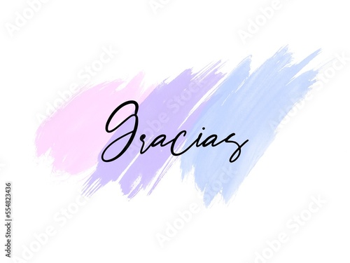 Gracias hand written lettering Thank you in Spanish language on abstract watercolor brushed background