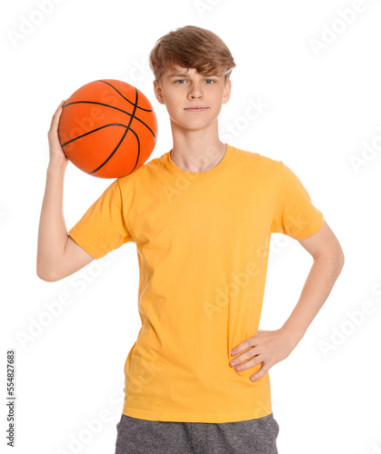 Teenage boy with basketball ball on white background