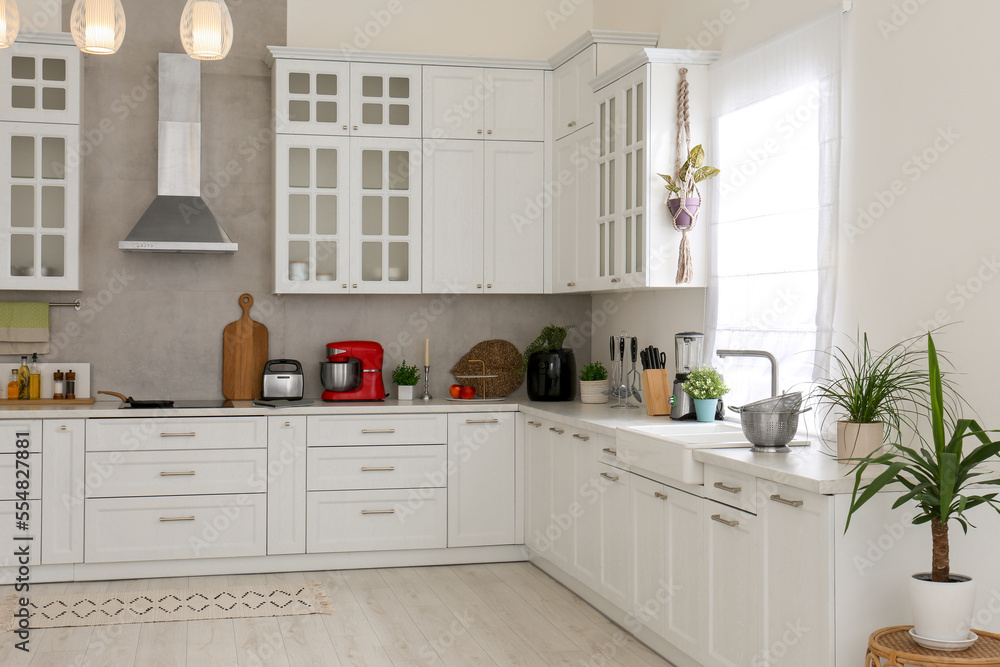 Beautiful kitchen interior with stylish modern furniture Beautiful kitchen interior with stylish modern furniture
