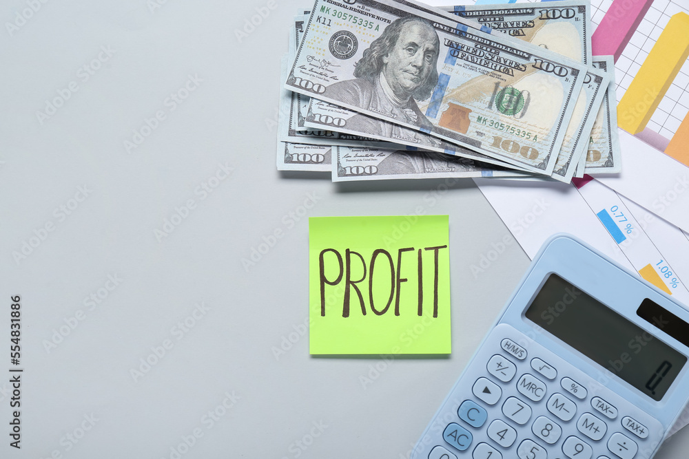 Sticky note with word Profit, calculator, banknotes and diagram on light grey background, flat lay. Space for text Sticky note with word Profit, calculator, banknotes and diagram on light grey background, flat lay. Space for text