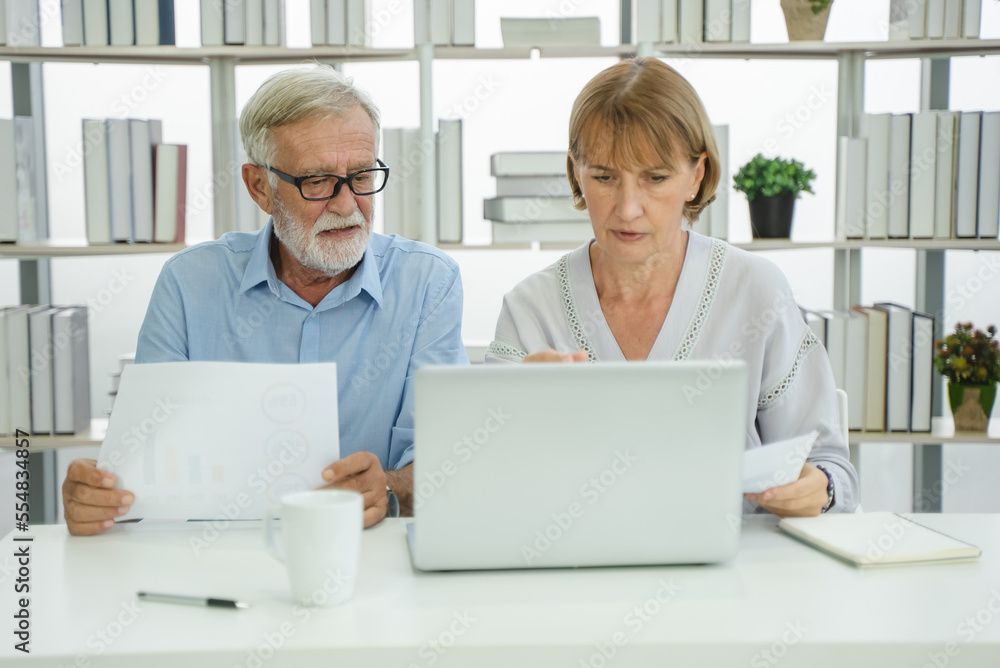 Mature married couple plan money invest for retired