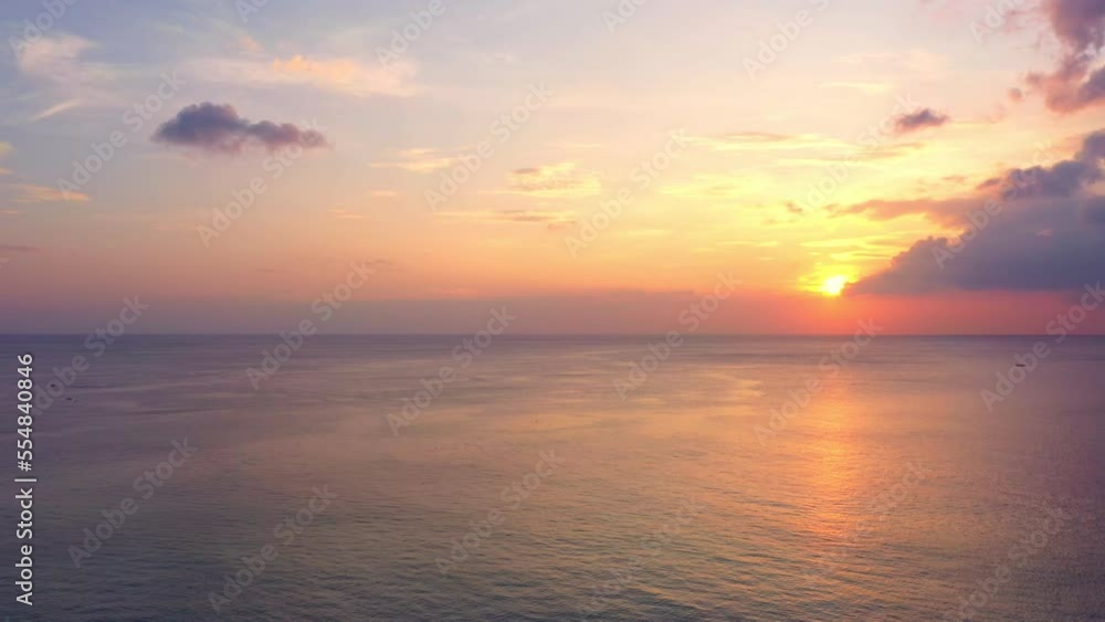 scenery sunset above the ocean clouds cover the ocean during colorful .cloud in sunset on Karon beach Phuket Thailand. .video 4K. Scene of sweet yellow light in the sky background. scenery sunset above the ocean clouds cover the ocean during colorful .cloud in sunset on Karon beach Phuket Thailand. .video 4K. Scene of sweet yellow light in the sky background.