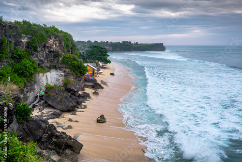 Beautiful view of Bali's Balangan beach in the evening of a windy day photo