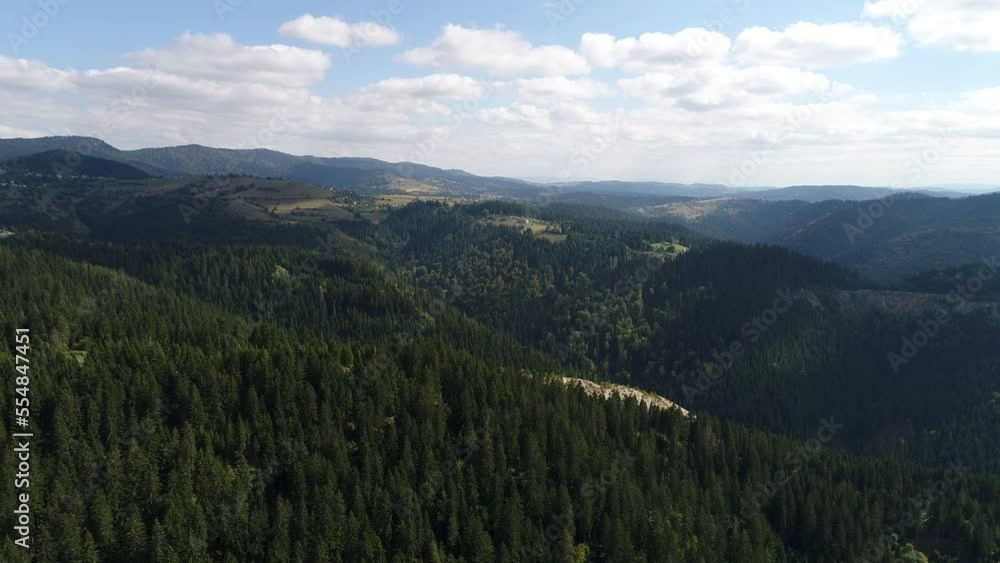 Aerial drone view of ATV quads on a dirt trail in forests. Off-road group team club enthusiasts having fun while driving countryside roads. Aerial drone view of ATV quads on a dirt trail in forests. Off-road group team club enthusiasts having fun while driving countryside roads.