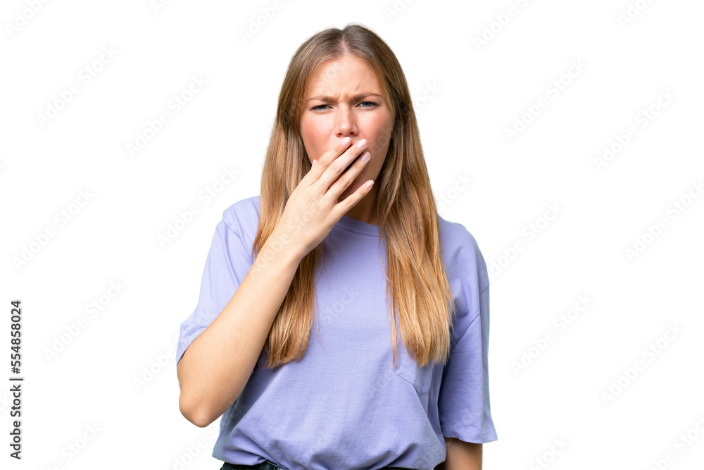 Young beautiful woman over isolated background yawning and covering wide open mouth with hand Young beautiful woman over isolated background yawning and covering wide open mouth with hand