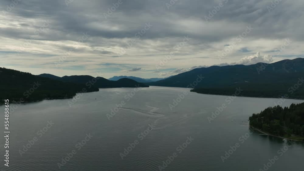 Serene Nature Of Whitefish Lake During Sunset In Flathead County, Montana, United States. Aerial Shot Serene Nature Of Whitefish Lake During Sunset In Flathead County, Montana, United States. Aerial Shot