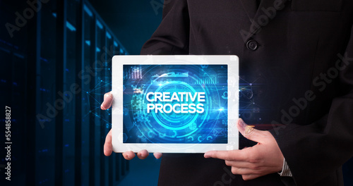 Wallpaper Mural Person holding tablet, business concept Torontodigital.ca