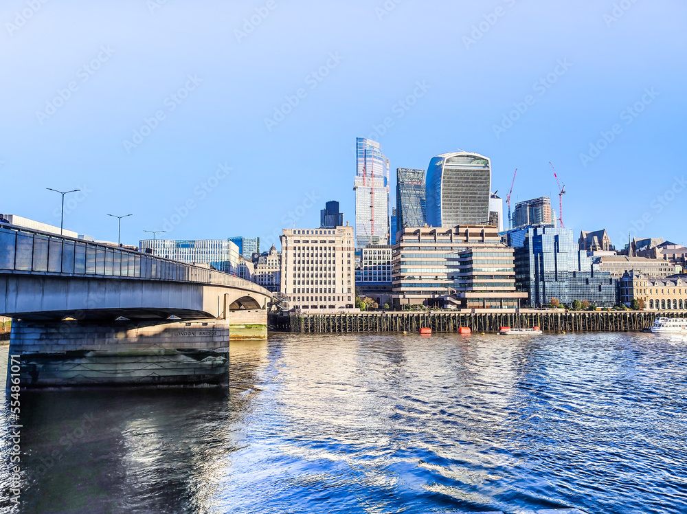 View of London part of the capital of Great Britain with the River Thames and the new skyscrapers of The City.