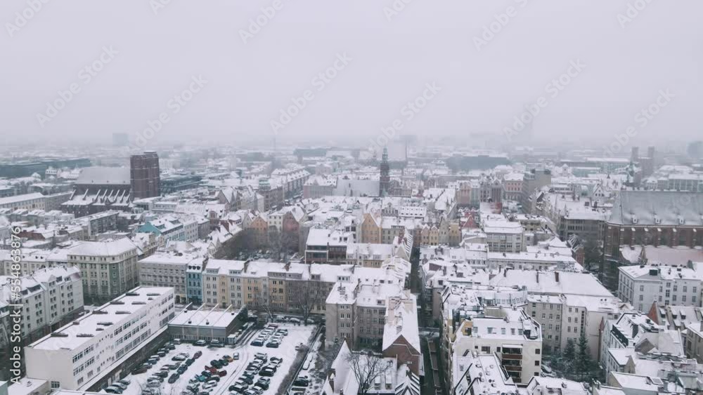 Winter aerial view with snowfall on old city of Wroclaw and market square with panoramic view 4k Winter aerial view with snowfall on old city of Wroclaw and market square with panoramic view 4k